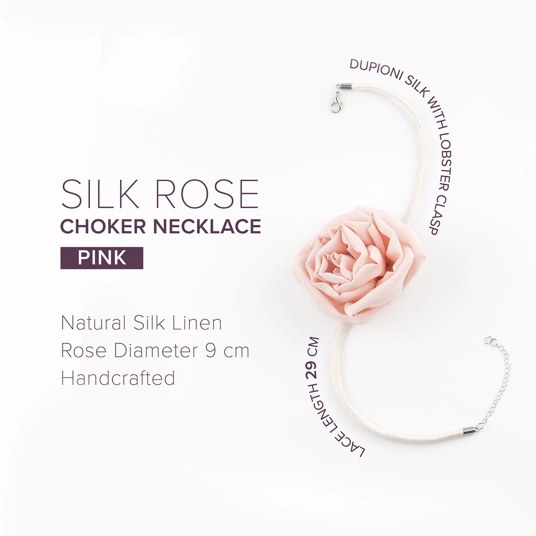 Product graphic showing the Pink Silk Rose Choker Necklace with details: natural silk rose, 9 cm diameter, dupioni silk band with lobster clasp, total length 29 cm.