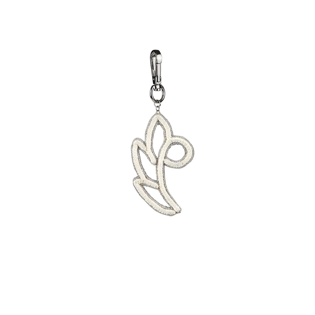Handmade white and silver floral bag charm with seed beads, metallic cord outline, and metal clip attachment