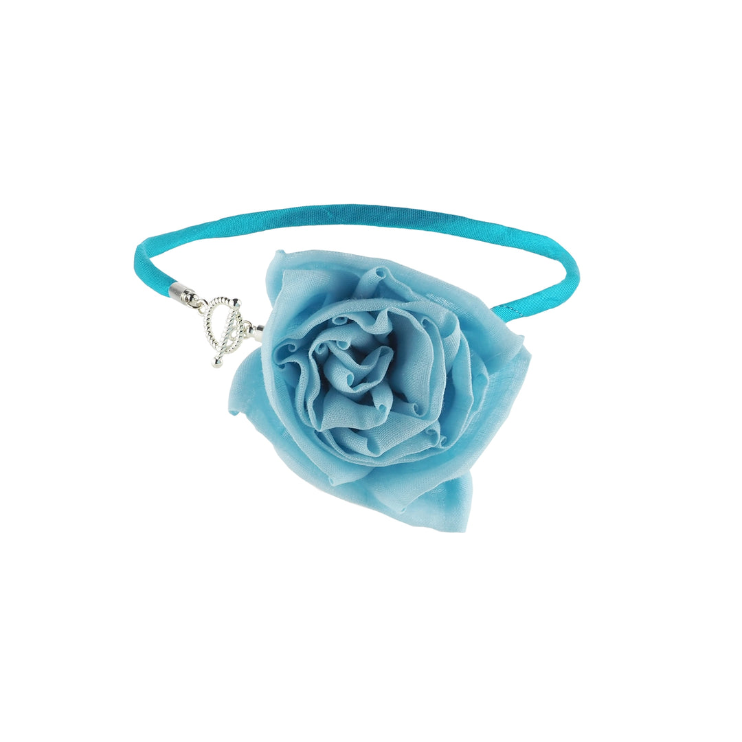 Side view of handcrafted blue silk rose choker necklace with dupioni silk cord and toggle clasp
