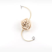 Detailed view of handmade silk chiffon rose choker necklace in beige with suede lace